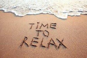 Time to Relax written in the sand